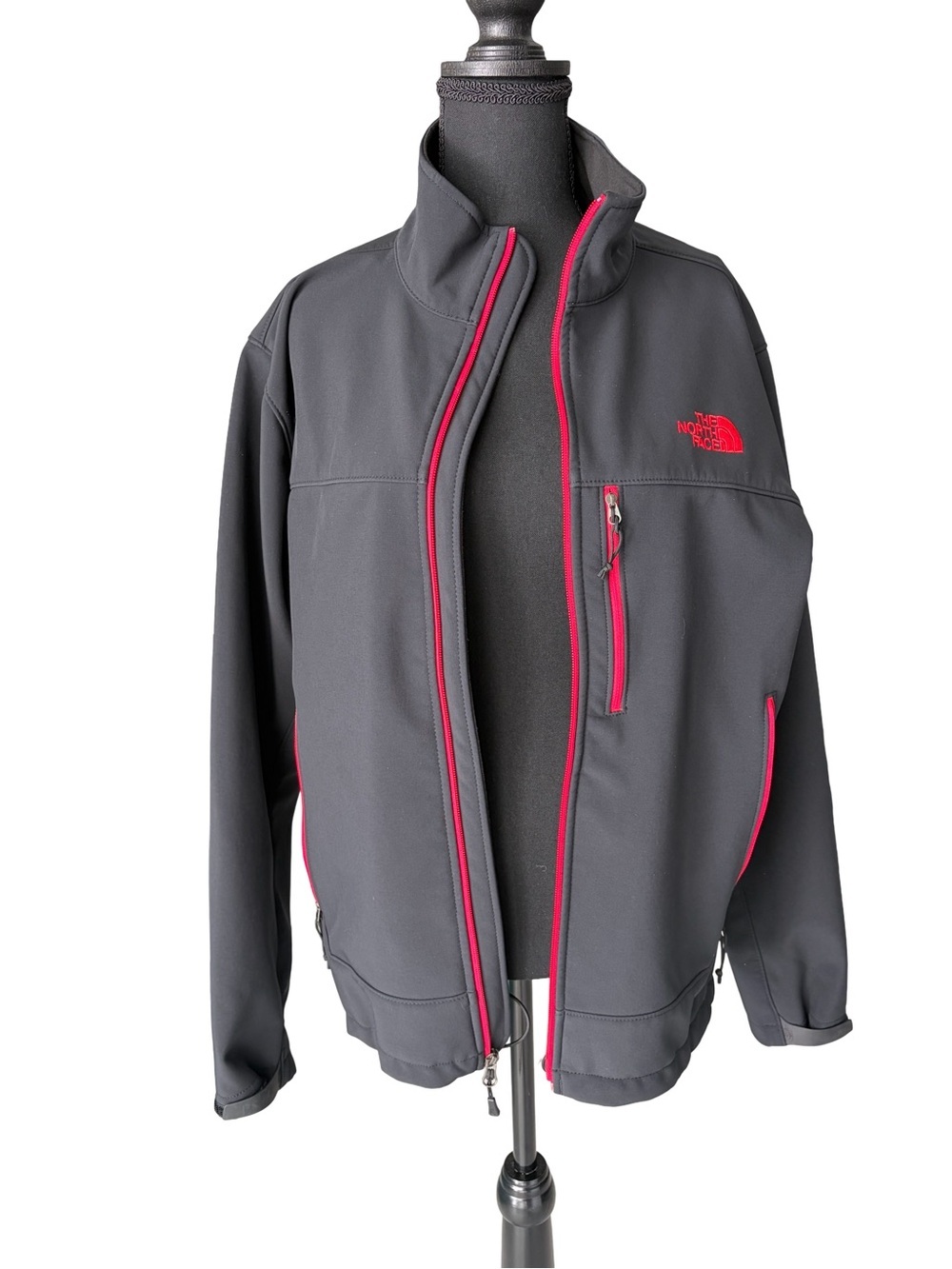 The North Face Men's Black Jacket with Red Accents